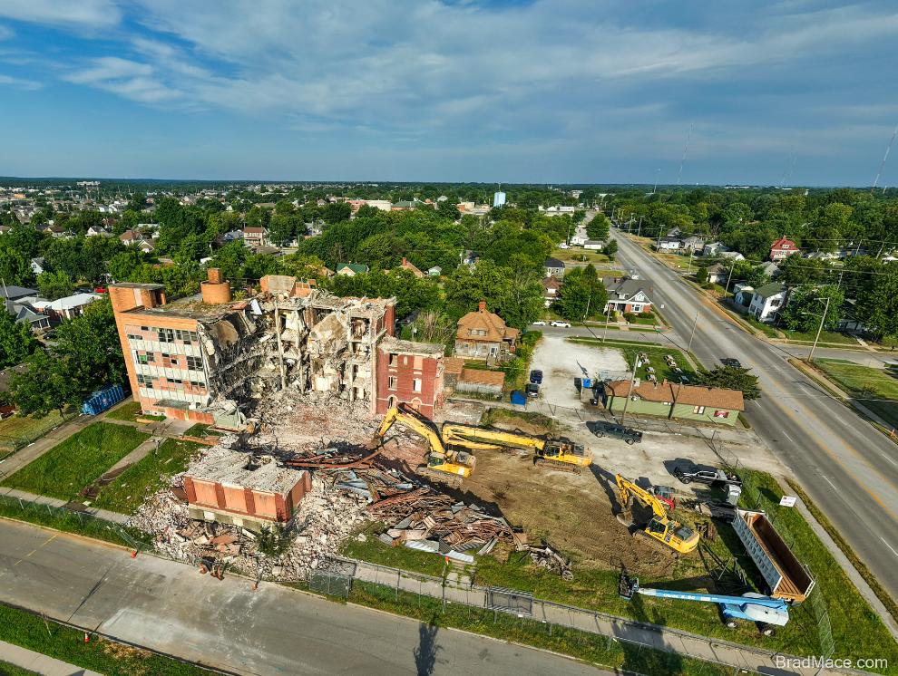 Aerial view of demolition site in residential neighborhood
